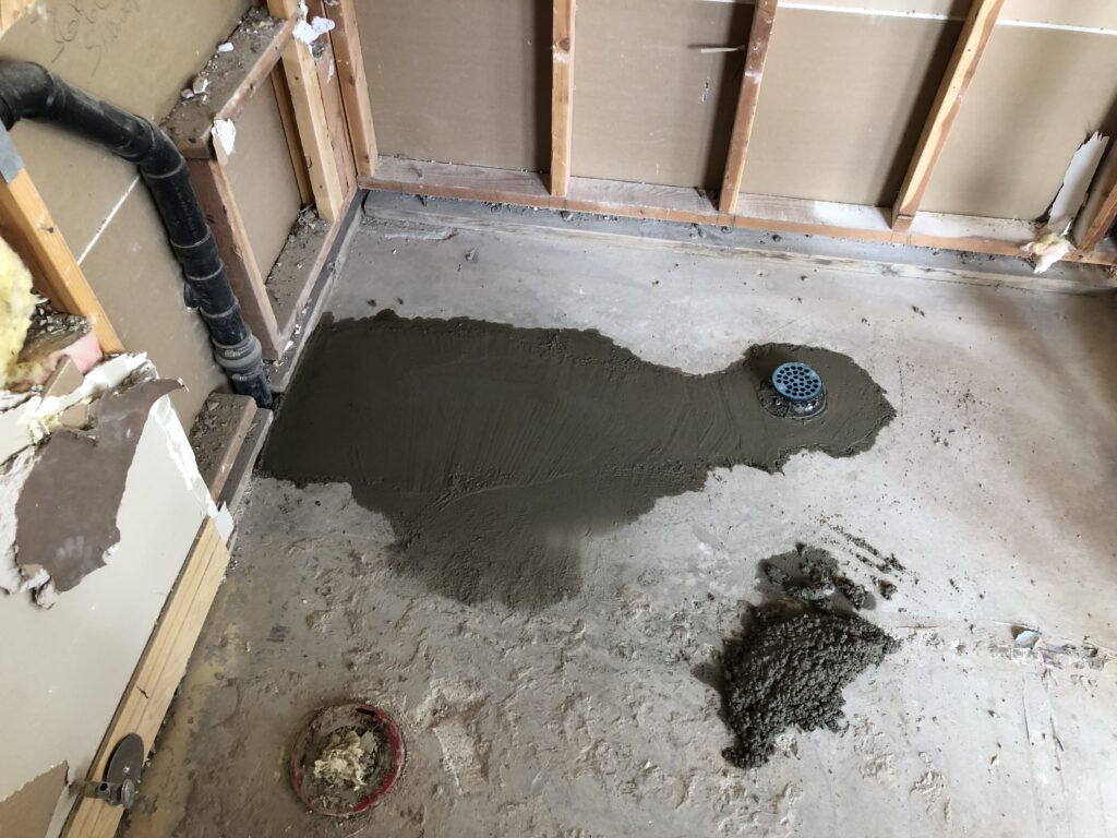 Freshly applied concrete repair and leveling material