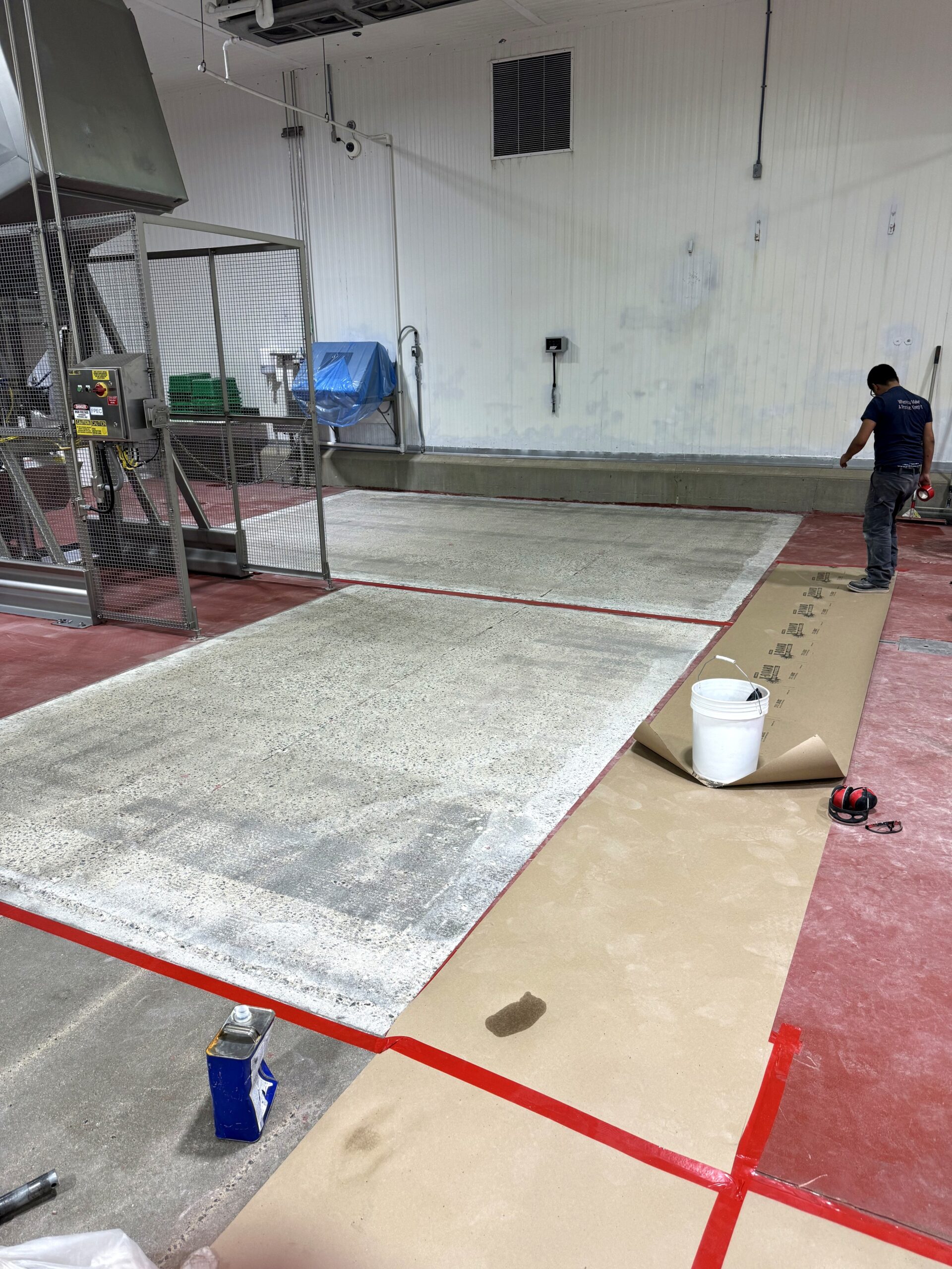 Installation in a food processing facility showing concrete work in progress. — food processing facility flooring requirements