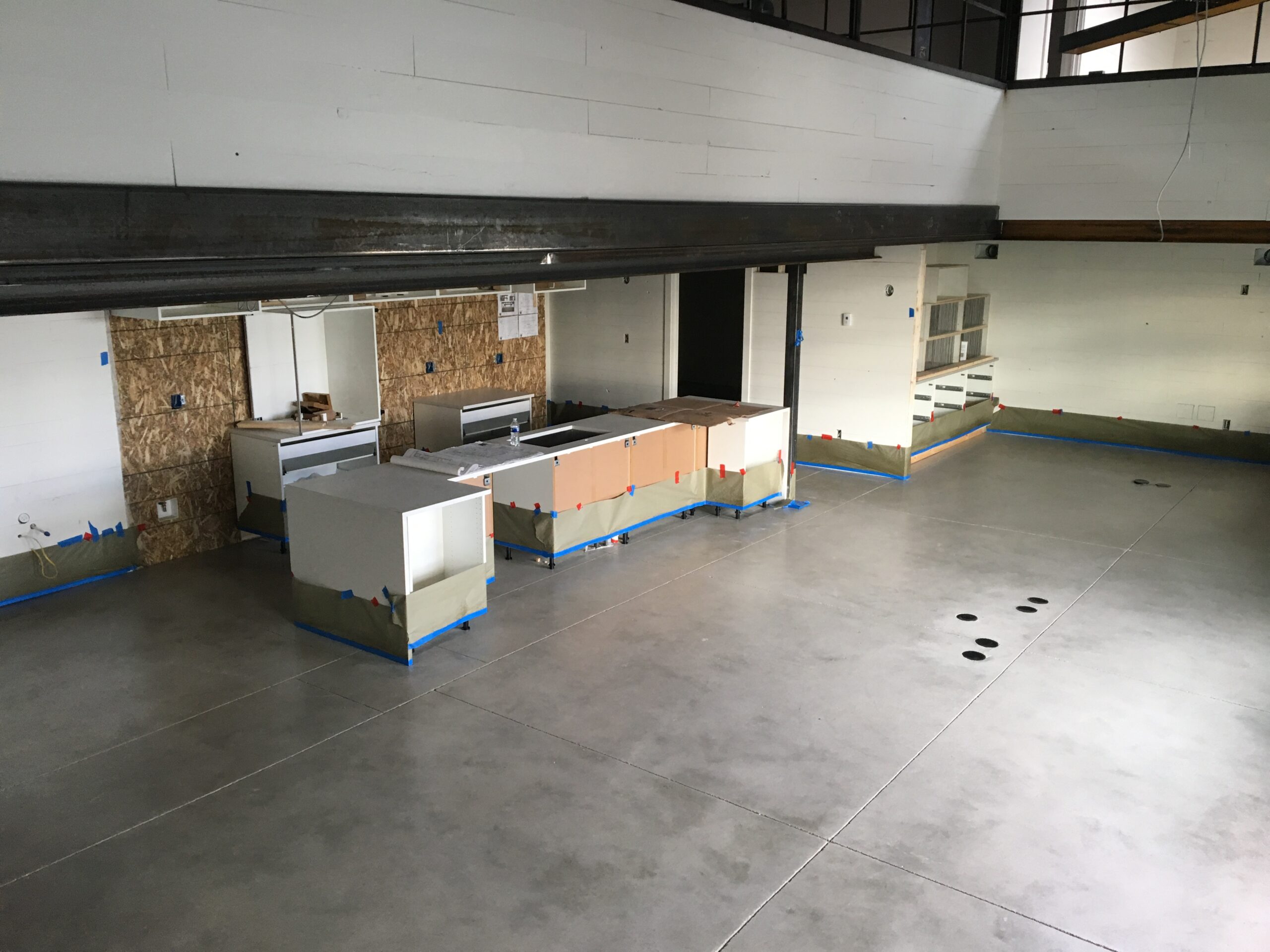 Commercial workshop with completed grind and seal concrete flooring