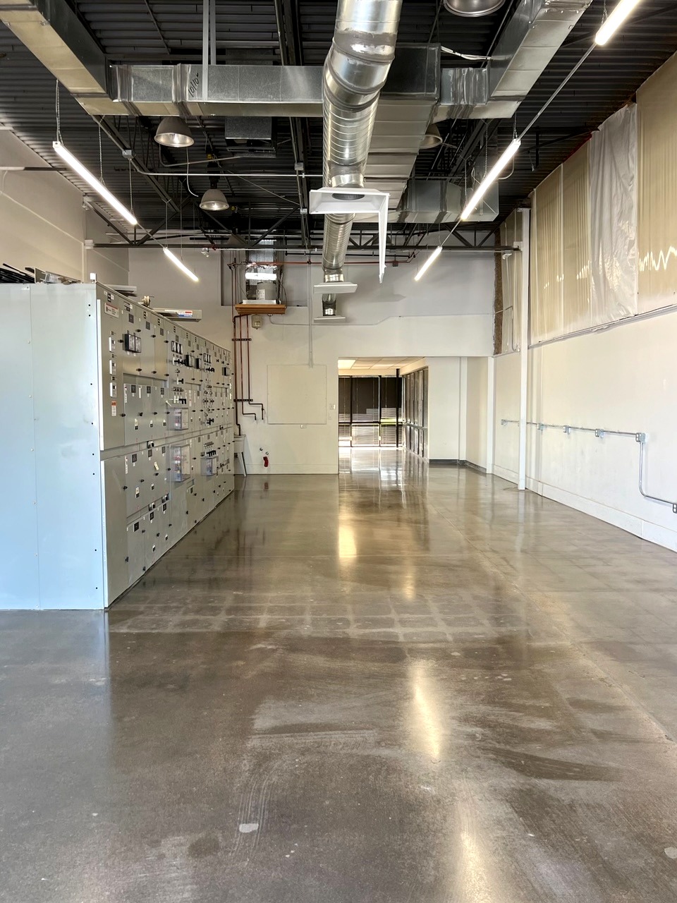 Interior of a data center facility with polished concrete flooring. — data center flooring requirements