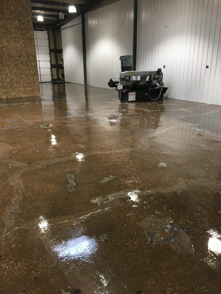 Glossy grind and seal concrete floor in a warehouse workshop — CCR install