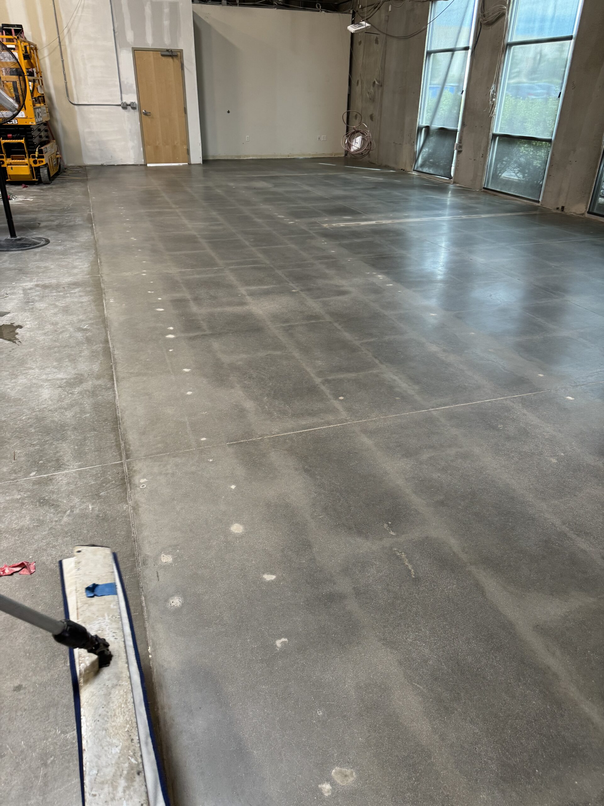 A wide shot of a polished concrete floor in a commercial space. — commercial polished concrete flooring