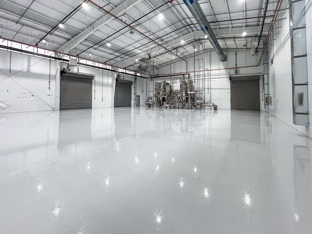 Commercial epoxy floor showing coating conditions in a facility.