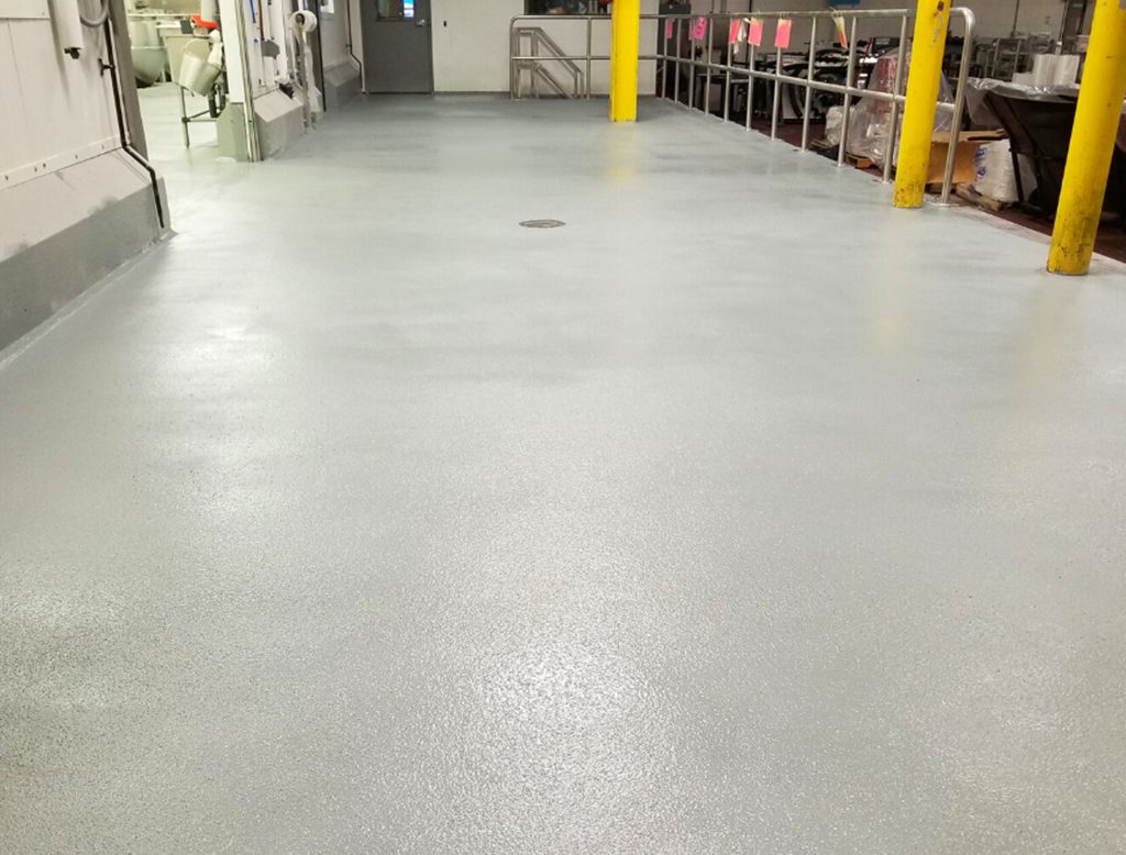 Broadcast urethane cement floor in a Denver food facility — CCR install